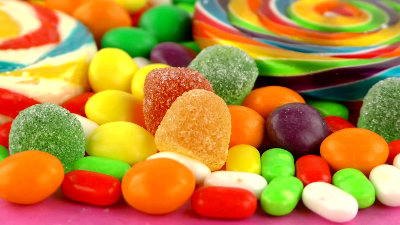 Free Stock Video Scrambled Candies And Gums Spinning Shot Live Wallpaper - Free Download
