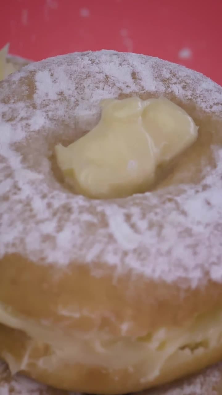 Free Video Stock Spreading Icing Sugar On A Donut With Custard Live Wallpaper - Free Download