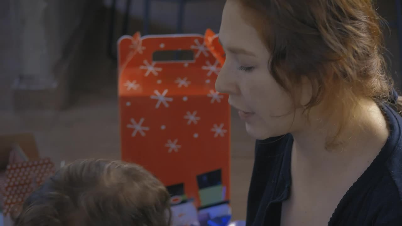 Stock Video Mother Combing Her Little Daughter Sitting On The Floo Animated Wallpaper - Free Download