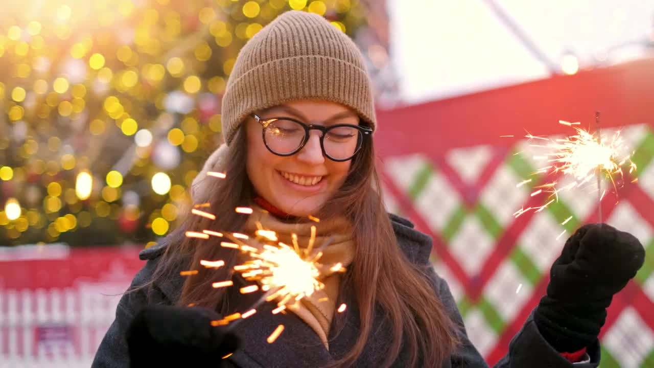 Stock Video Happy Girl Holding Sparkles At Christmas Animated Wallpaper - Free Download