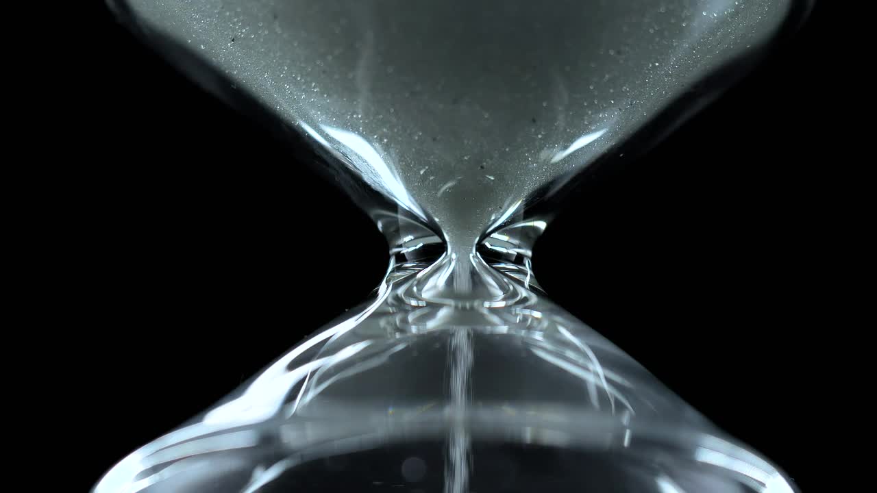 Stock Video Glass Hourglass Close Up On A Black Background Live Wallpaper For PC - Free Download