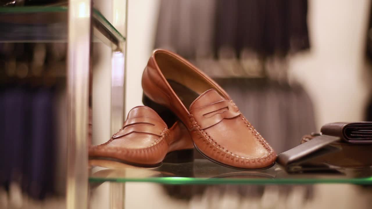 Stock Video Pair Of Shoes On A Sideboard Are Taken By A Live Wallpaper - Free Download