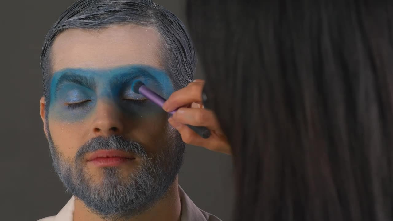 Free Stock Video Woman Putting Makeup On A Man With A Winter Style Live Wallpaper - Free Download