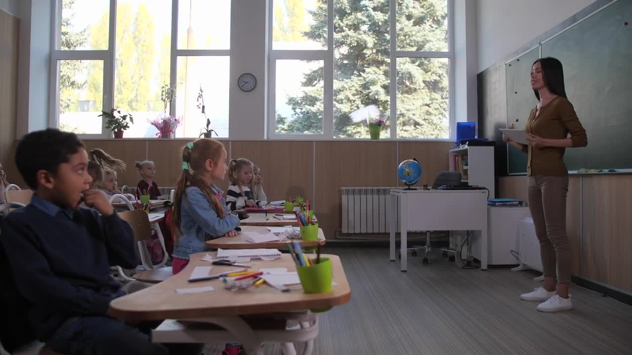 Free Video Stock teacher speaking to her class Live Wallpaper - Free Download