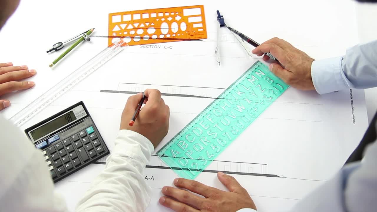 Free Stock Video Two Architects Working On An Architectural Plan Live Wallpaper - Free Download