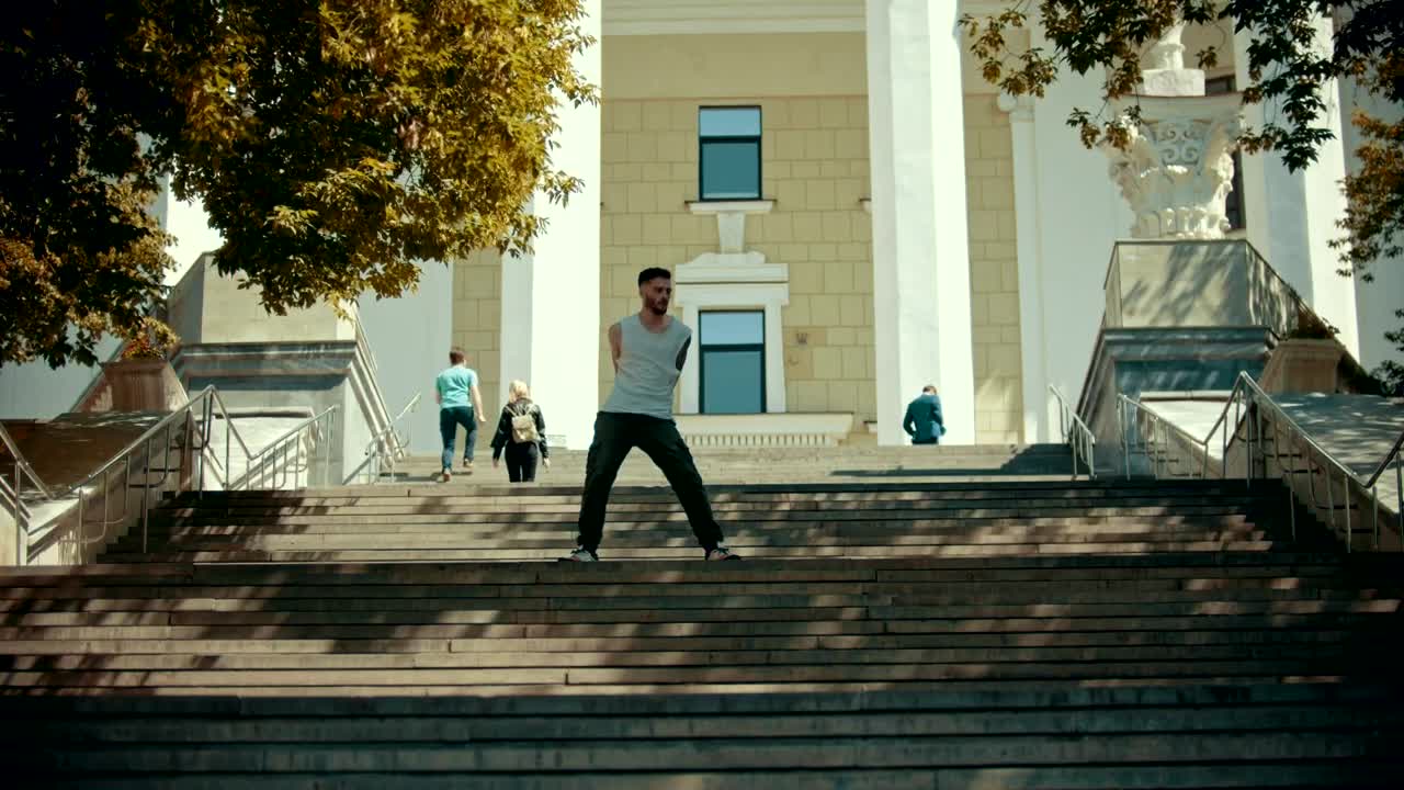 Stock Video Man Dancing On Some Stairs In The Street Animated Wallpaper - Free Download