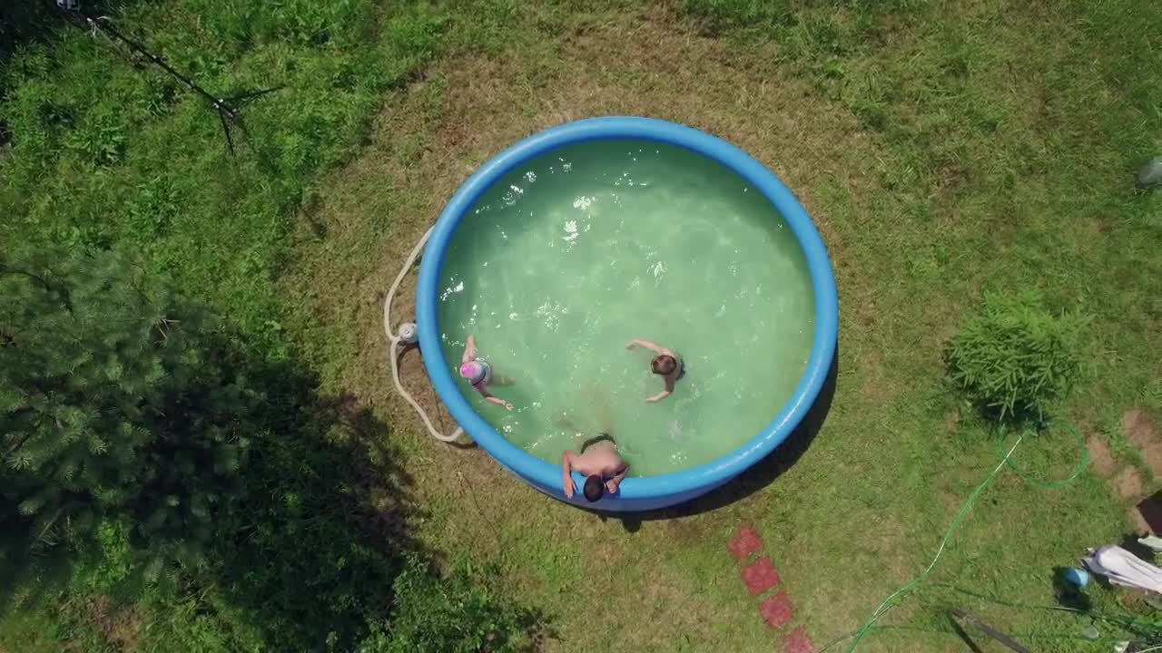 Video Stock Children Splashing In A Backyard Pool Live Wallpaper For PC - Free Download