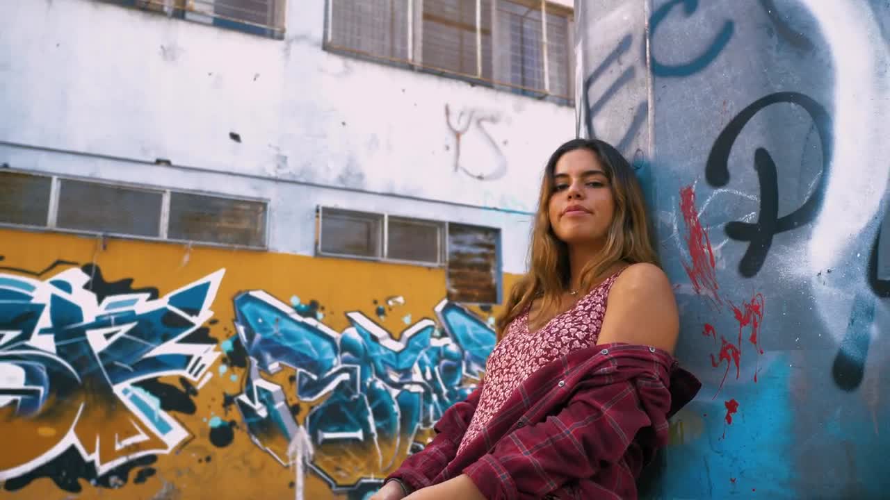 Stock Video Girl Leaning Against A Wall Covered In Graffiti Live Wallpaper For PC - Free Download