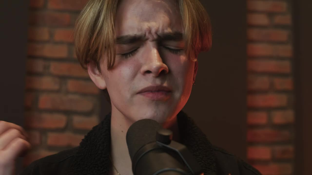 Free Stock Video Young Man Singing Into A Microphone Live Wallpaper - Free Download
