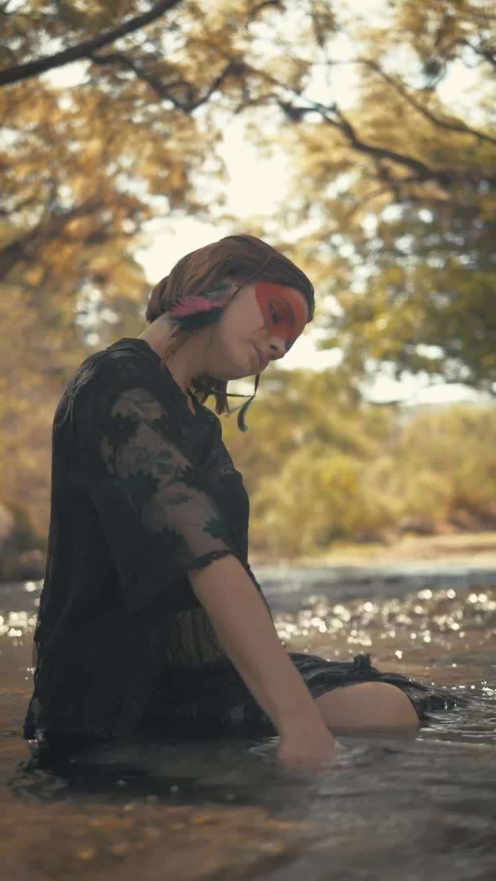 Stock Video Indie Fashion Girl Sitting On Water Animated Wallpaper - Free Download