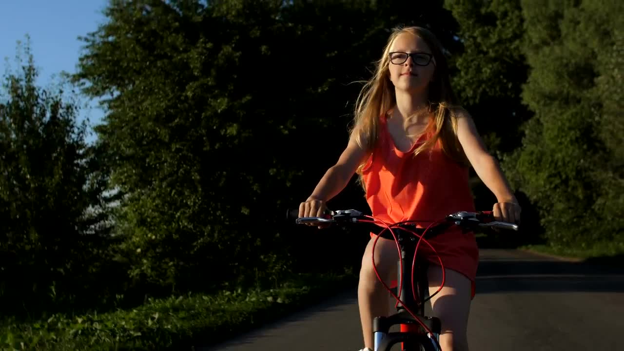 Stock Video Girl Riding A Bike On A Path In Nature Live Wallpaper For PC - Free Download