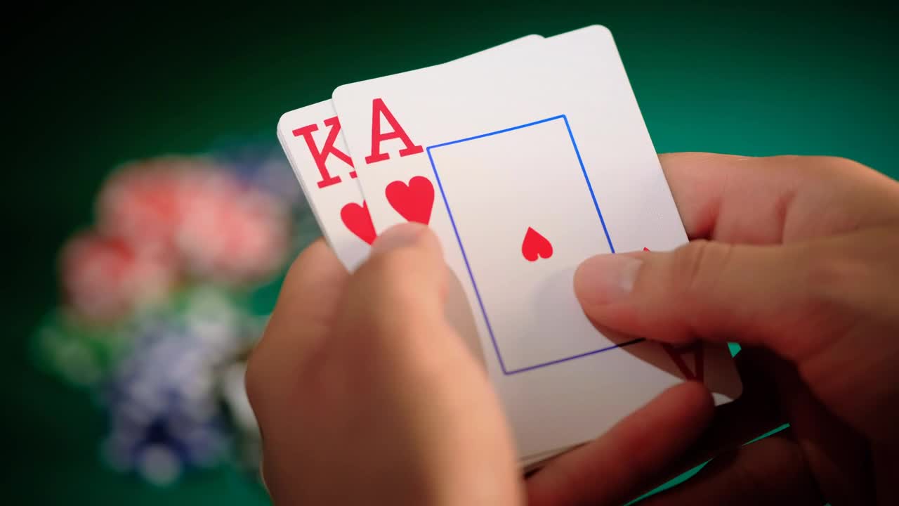 Stock Video Focus On The Hands With Cards Of A Poker Player Live Wallpaper For PC - Free Download