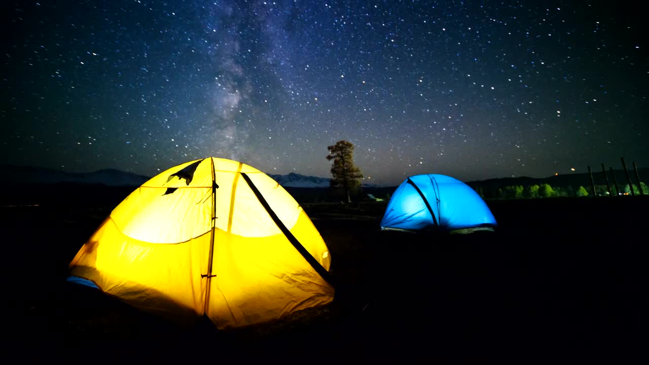 Stock Video Colorful Lit Tents With Time Lapse Of Night Sky And Live Wallpaper For PC - Free Download