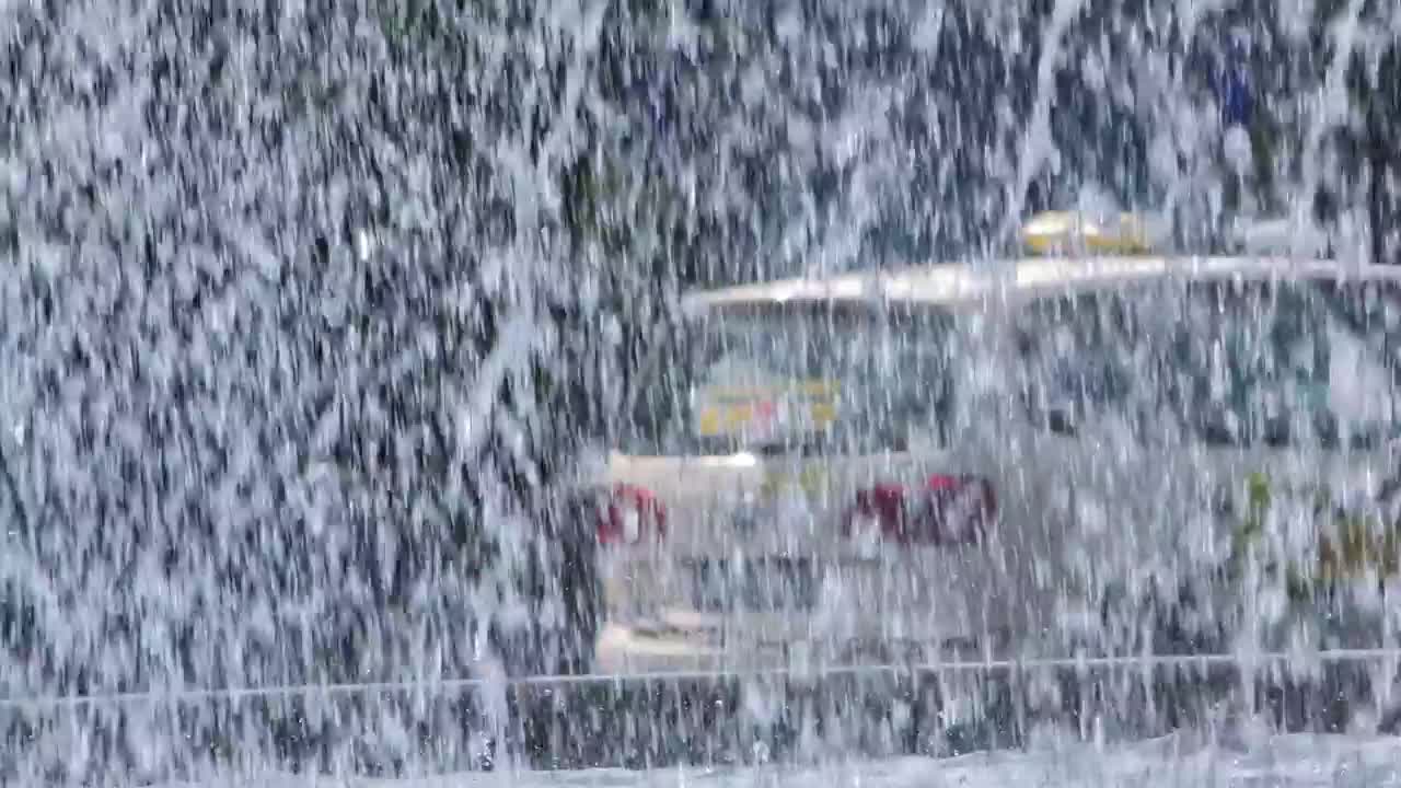 Video Stock City Traffic After Water From A Fountain Live Wallpaper For PC - Free Download