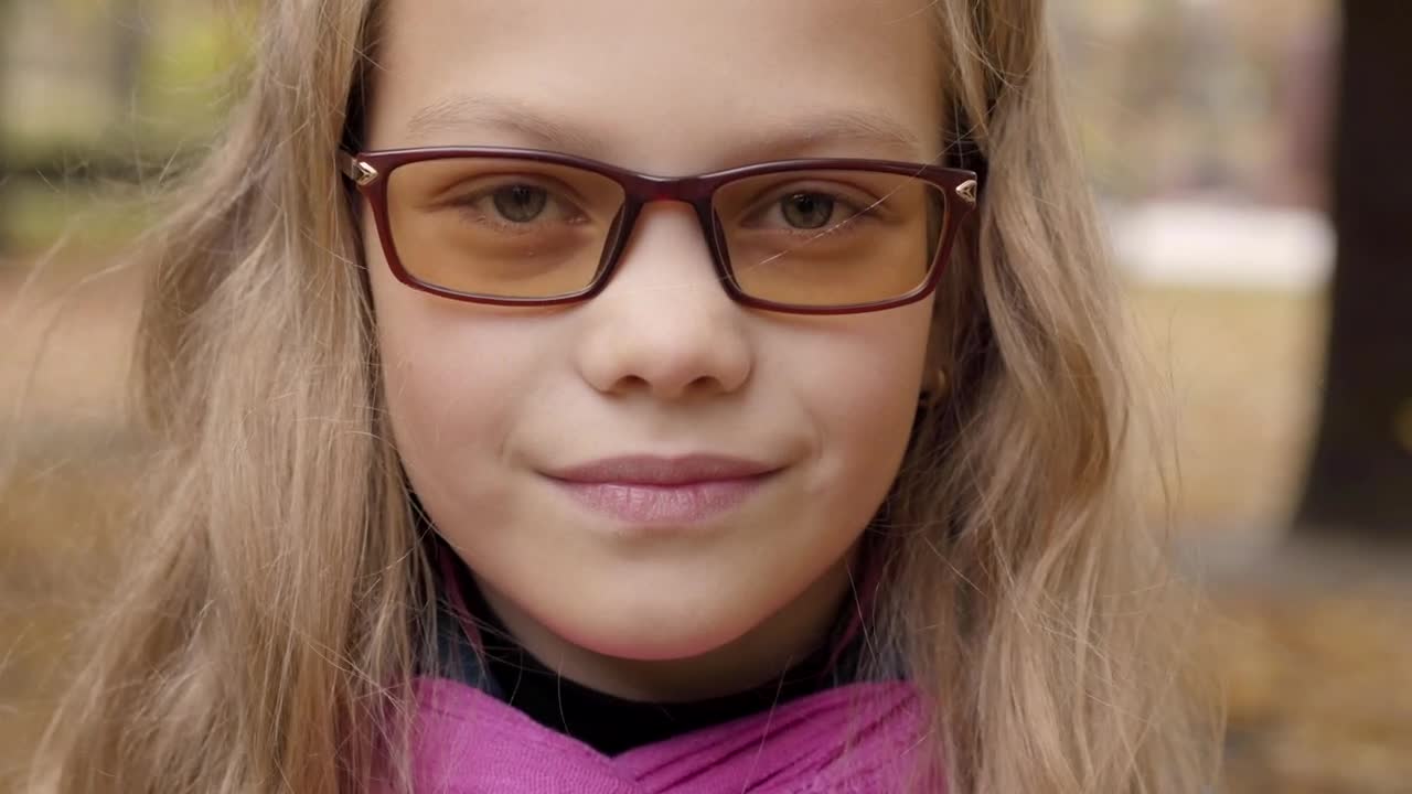 Free Stock Video Shy Little Girl In Glasses Looks Up To Camera Live Wallpaper - Free Download
