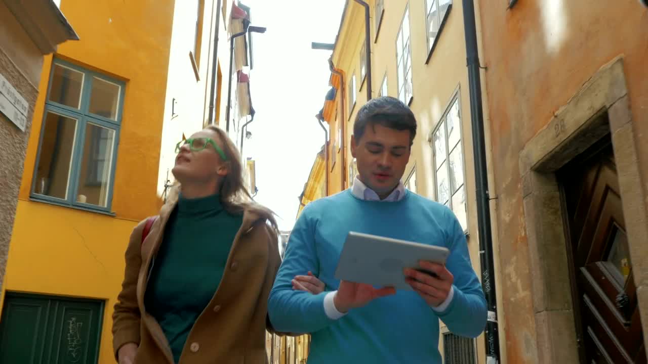 Stock Video Navigating Town Using A Tablet Live Wallpaper - Free Download