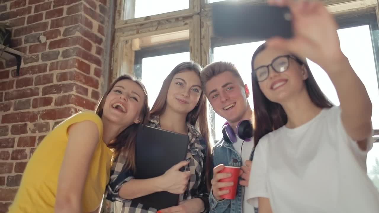 Stock Video Friends Smile For Group Selfie In Front Of Sunlit Window Live Wallpaper For PC - Free Download