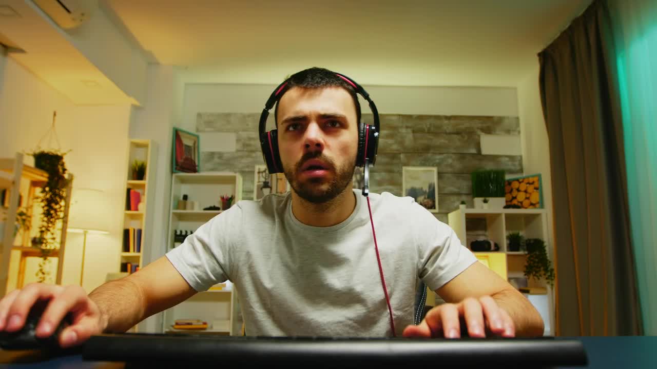 Stock Video Excited Gamer Playing In Their Room Live Wallpaper For PC - Free Download