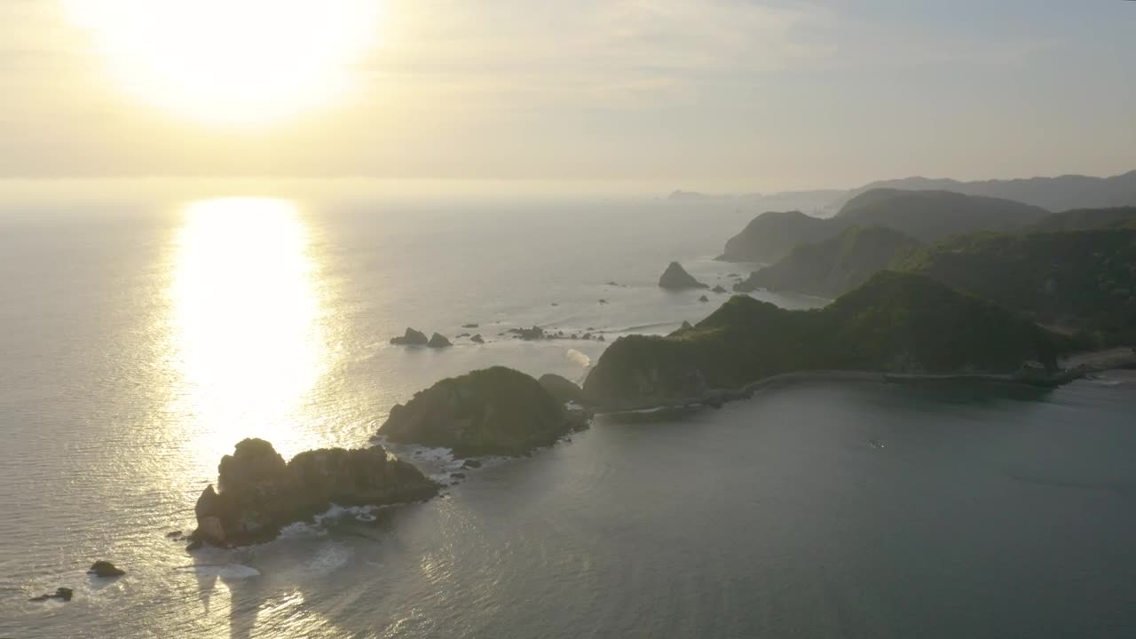 Stock Video Coast With Islands And Mountains Covered With Vegetation During A Live Wallpaper For PC - Free Download