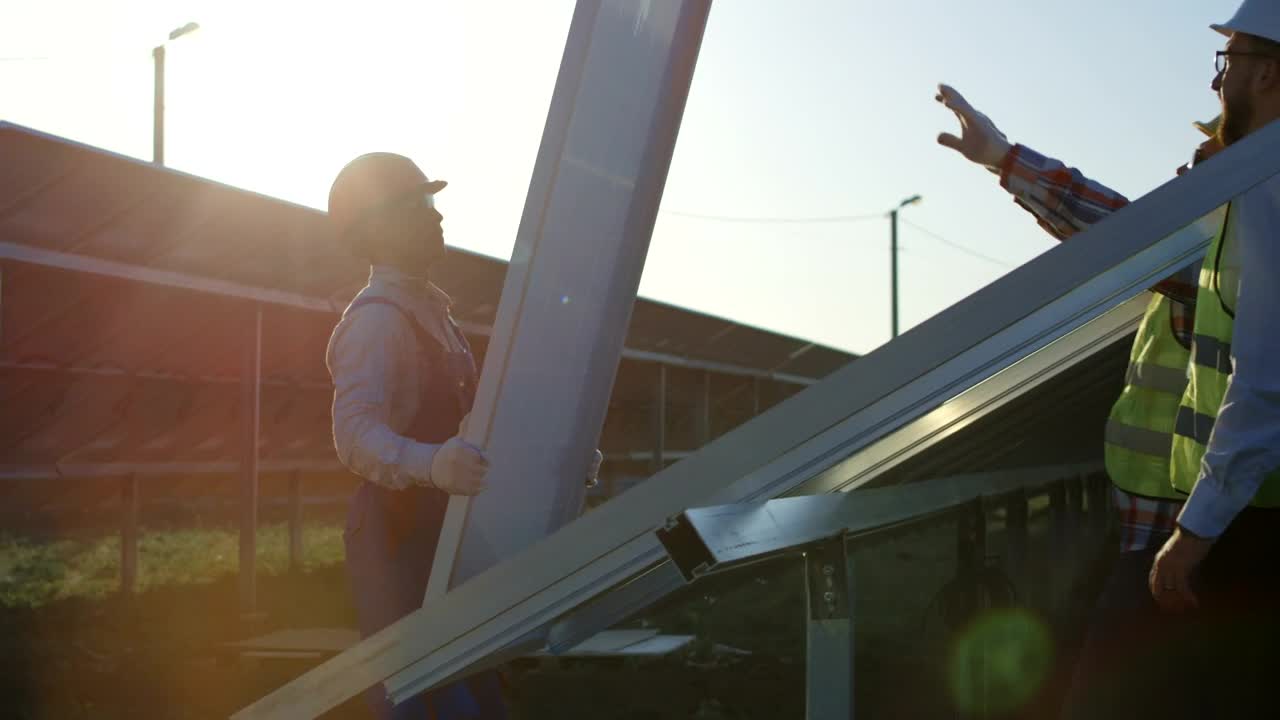 Stock Video Installing A Solar Panel In The Field Animated Wallpaper - Free Download