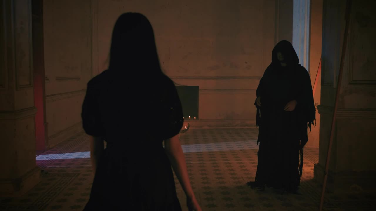 Free Stock Video Young Woman And Hooded Man Around An Altar With Candles Live Wallpaper - Free Download