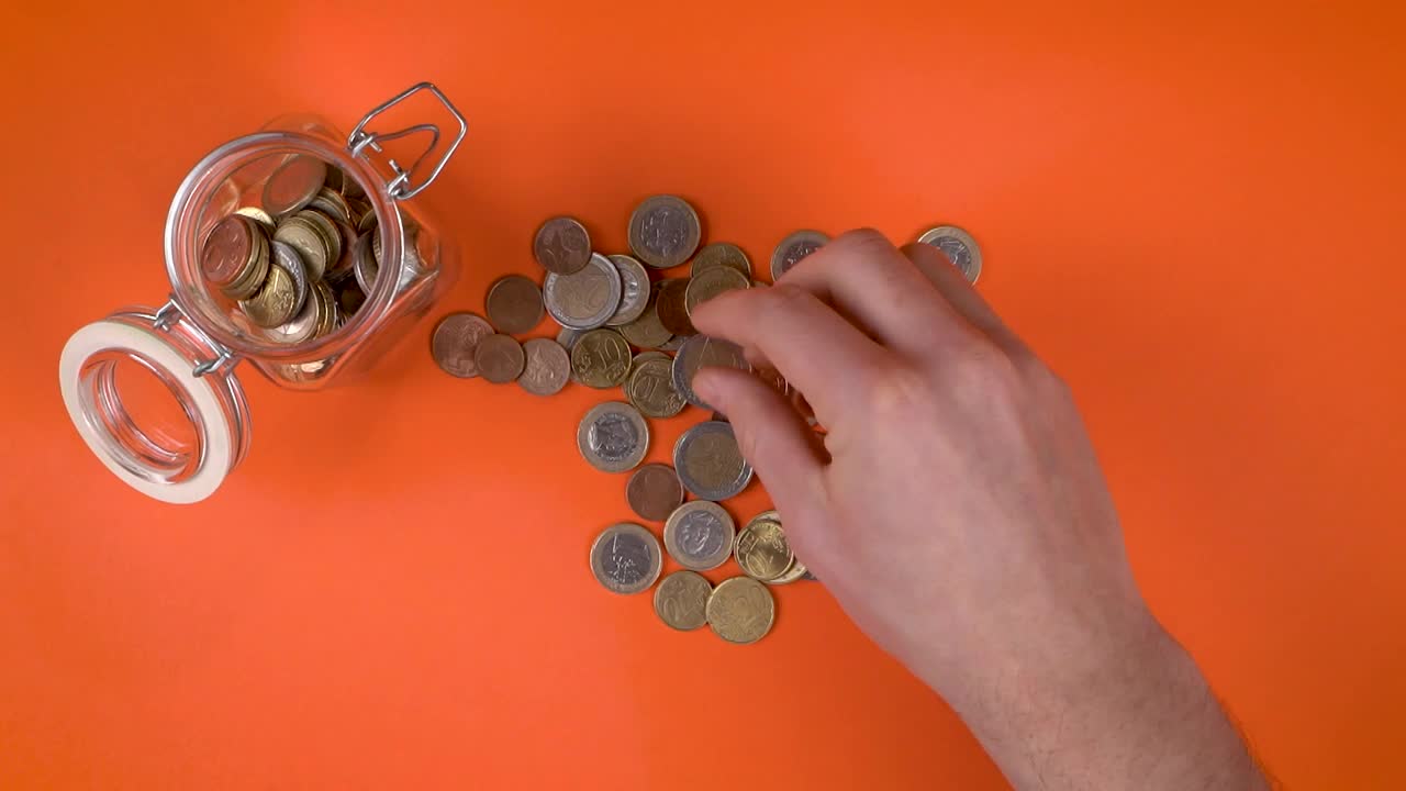 Stock Video Filling Jar Glass With Coins Live Wallpaper For PC - Free Download