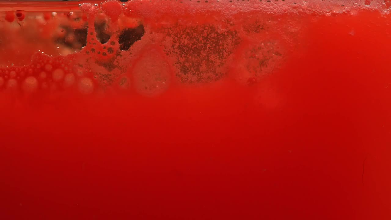 Video Stock Close Up View Of A Bubbling Red Liquid Live Wallpaper For PC - Free Download