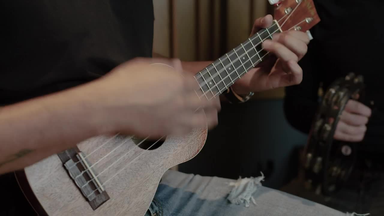 Stock Video Guitarist Playing A Little Ukelele Live Wallpaper For PC - Free Download