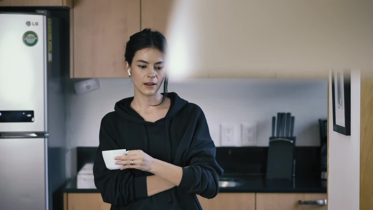 Stock Video Girl On A Call While Drinking A Cup Of Coffee Live Wallpaper For PC - Free Download