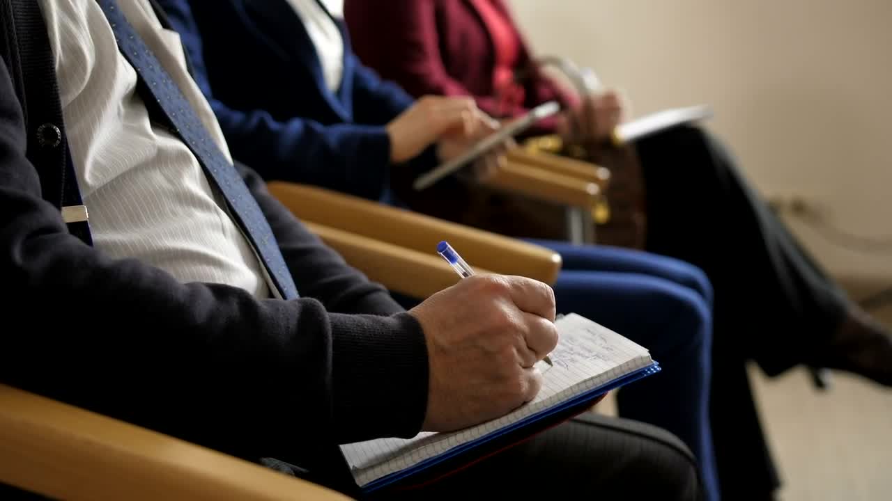 Stock Video People Taking Notes During A Meeting Live Wallpaper - Free Download