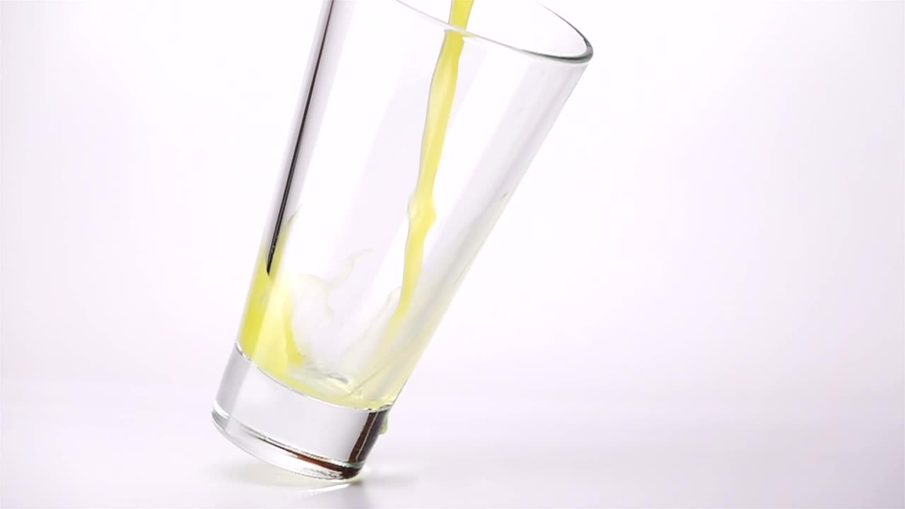 Stock Video Filling A Glass With Juice On A White Background Live Wallpaper For PC - Free Download