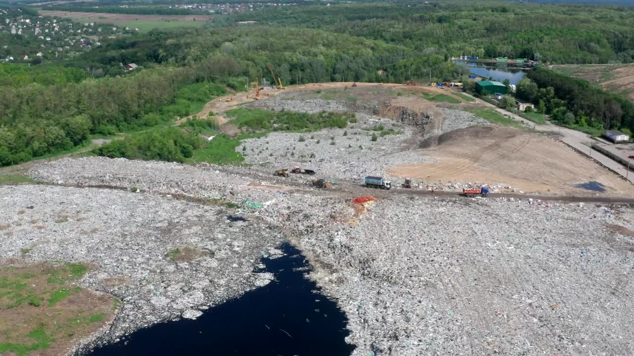 Stock Footage Waste Removal Trucks Working At A Landfill Live Wallpaper - Free Download