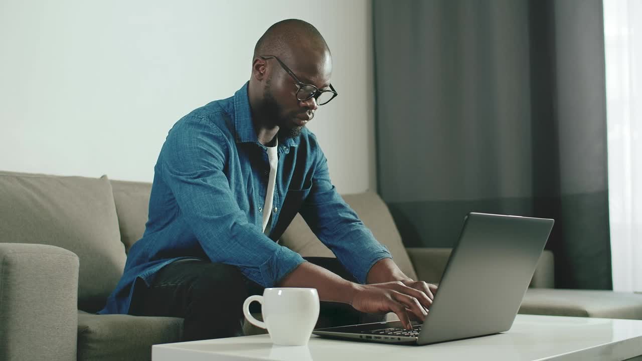 Stock Video Man Working From Home In His Living Roo Animated Wallpaper - Free Download