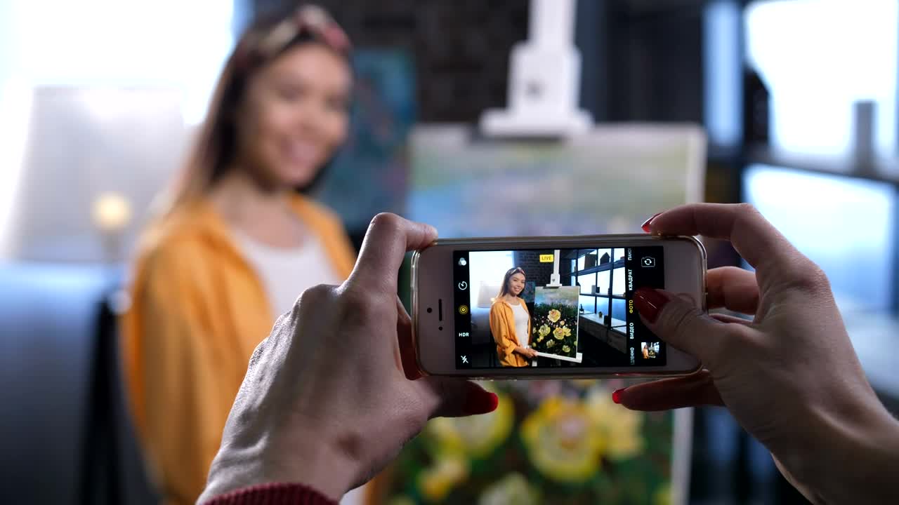 Free Video Stock taking a photo of an painter Live Wallpaper - Free Download