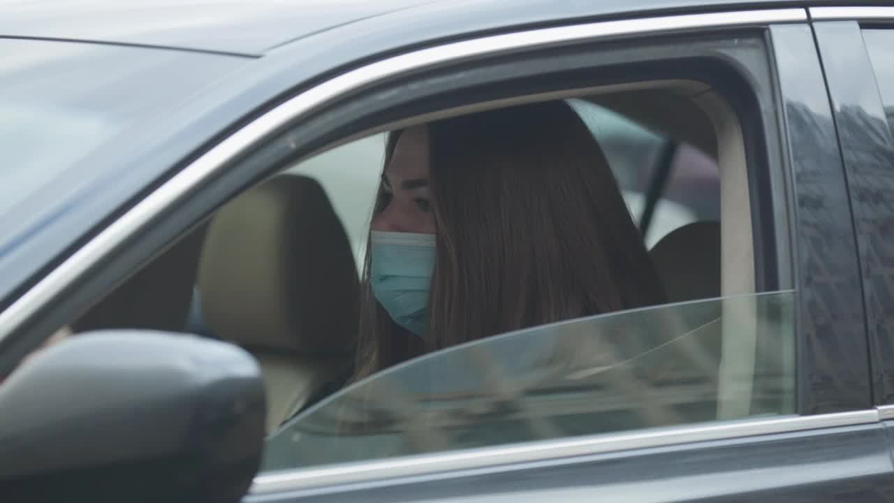 Stock Video Girl In A Car Coughing With Face Mask Live Wallpaper For PC - Free Download