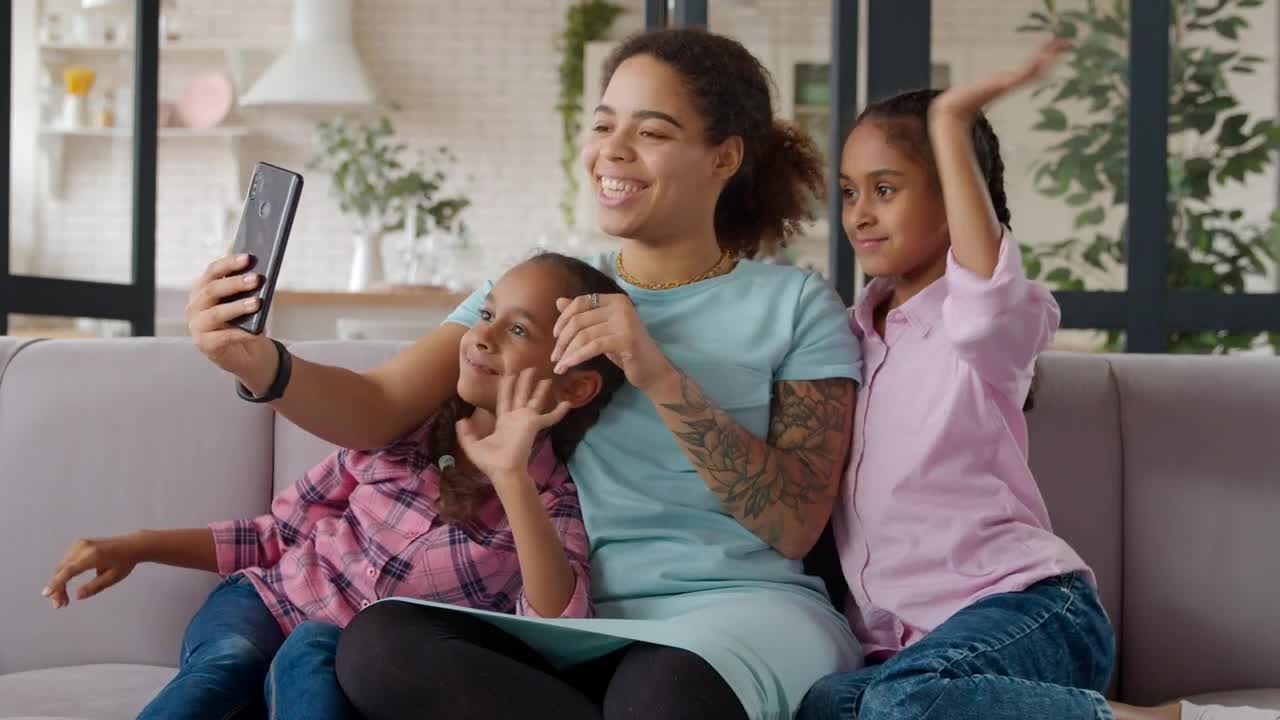Stock Video Family Making A Video Call On Smartphone Live Wallpaper For PC - Free Download