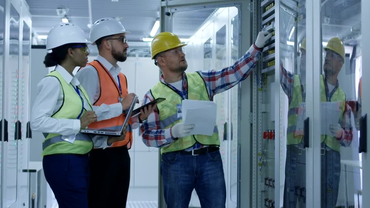 Stock Video Engineers Checking Equipment Data Live Wallpaper For PC - Free Download