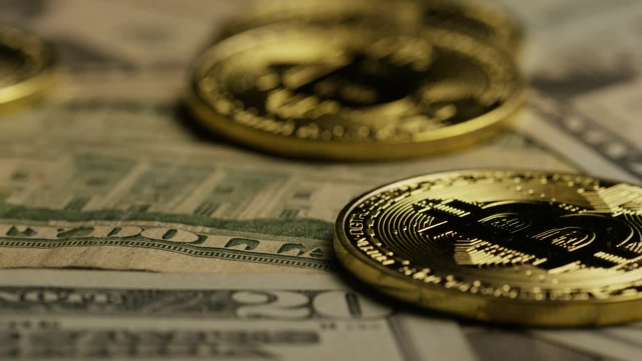 Stock Video Golden Bitcoin Coins Rotating Over Dollars Live Wallpaper For PC - Free Download