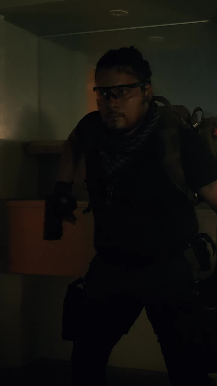 Stock Video Mercenary Draws His Gun In An Abandoned Hospita Animated Wallpaper - Free Download