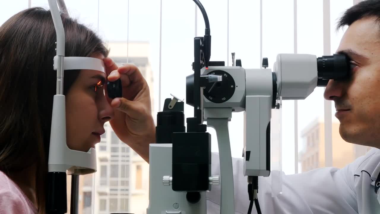 Stock Video Eye Exam With An Ophthalmologist And A Patient Live Wallpaper For PC - Free Download
