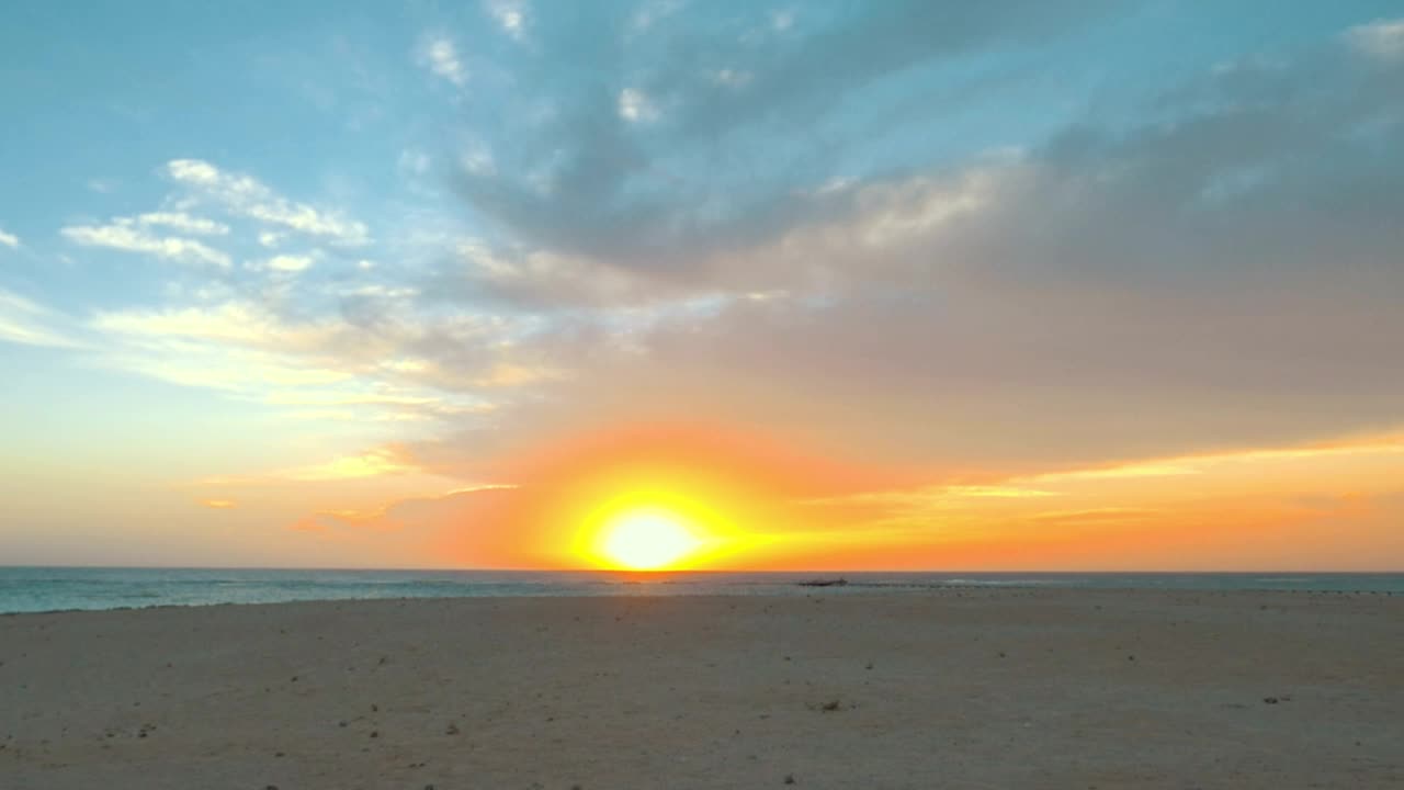 Free Video Stock sunset at the edge of a beach Live Wallpaper - Free Download
