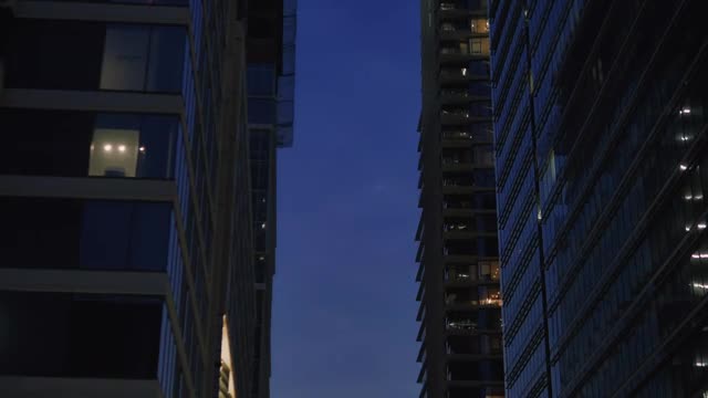Free Video Stock Street Between Large Buildings At Sunset At Christmas Live Wallpaper - Free Download