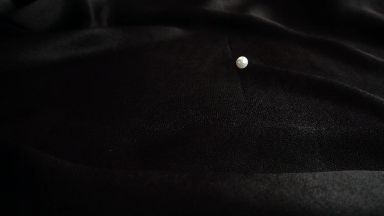 Stock Footage White Pearls On A Black Cloth Live Wallpaper - Free Download