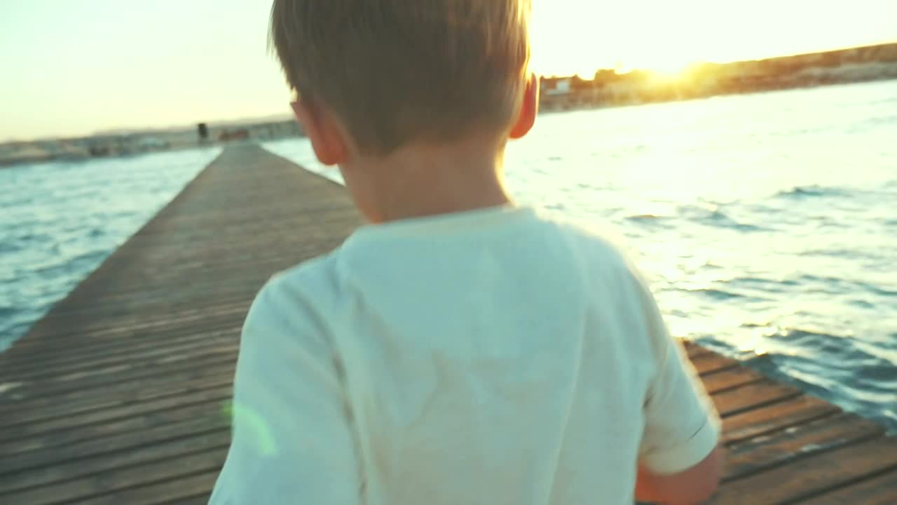 Free Video Stock Small Boy Running Along A Pier Live Wallpaper - Free Download