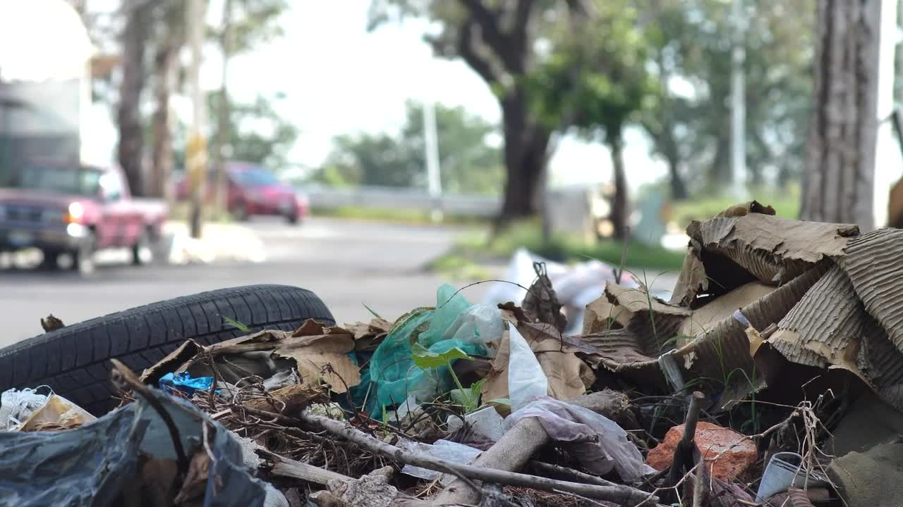 Free Video Stock trash pile on the street on a sunny day Live Wallpaper - Free Download