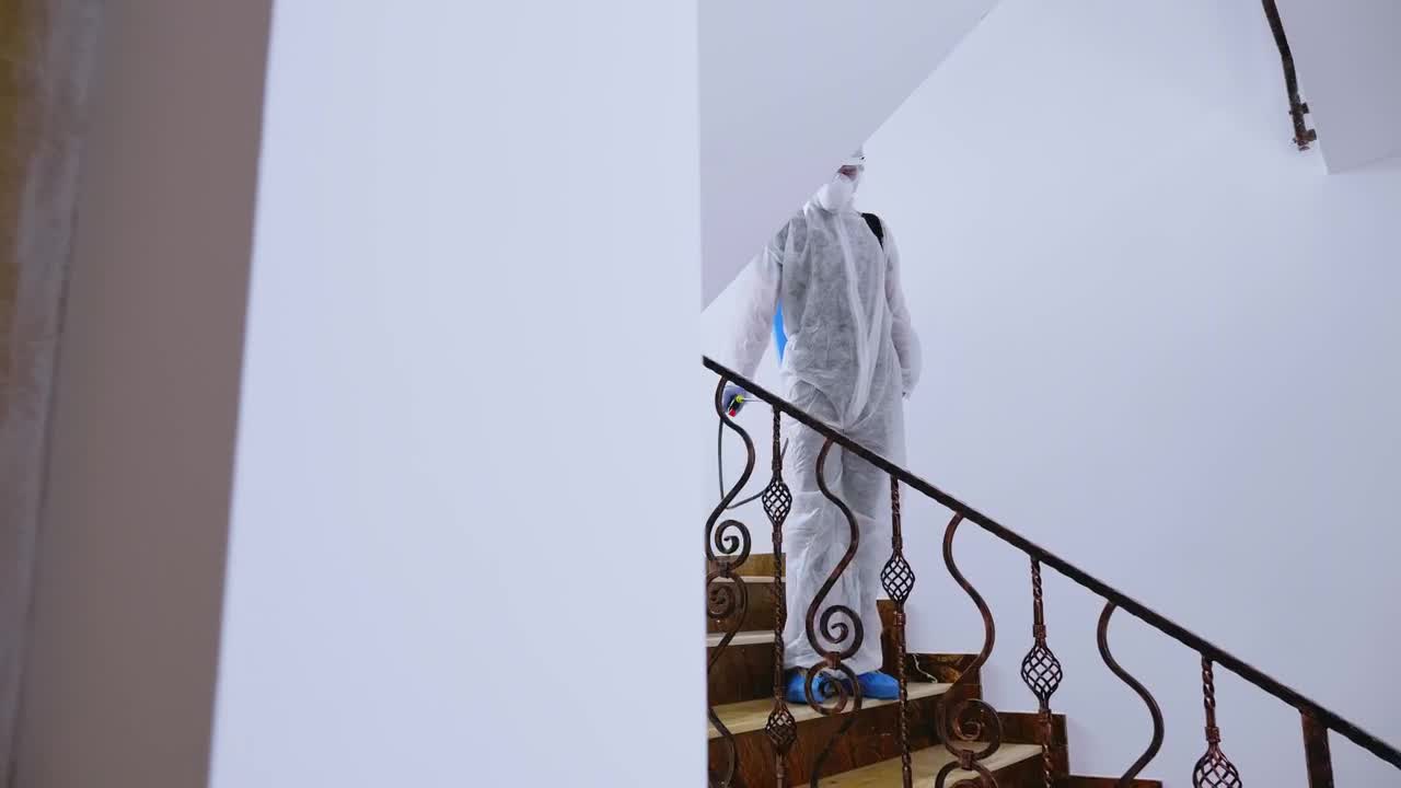 Stock Video Coronavirus Sanitization Of Hand Rail In Hazmat Suit Live Wallpaper For PC - Free Download