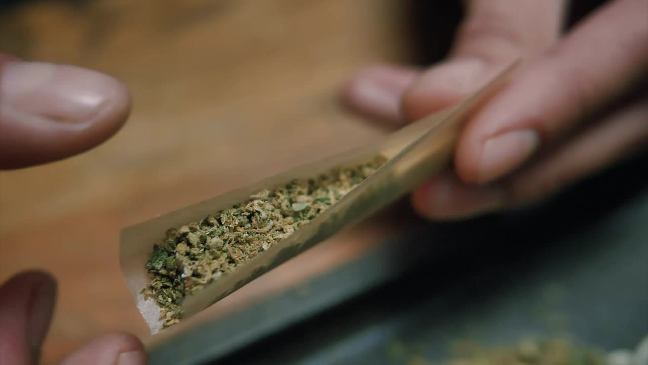 Stock Video Macro Shot Of Preparing A Joint Animated Wallpaper - Free Download