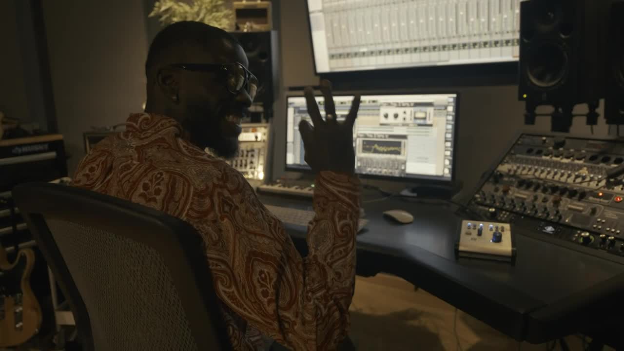 Video Stock Producer Working In A Recording Studio Live Wallpaper Free - Free Download