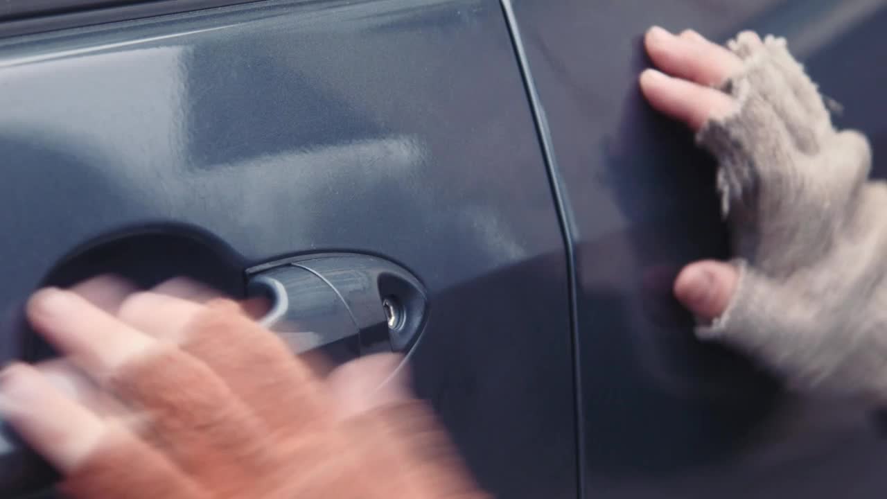 Free Video Stock thief unlocking a car door Live Wallpaper - Free Download