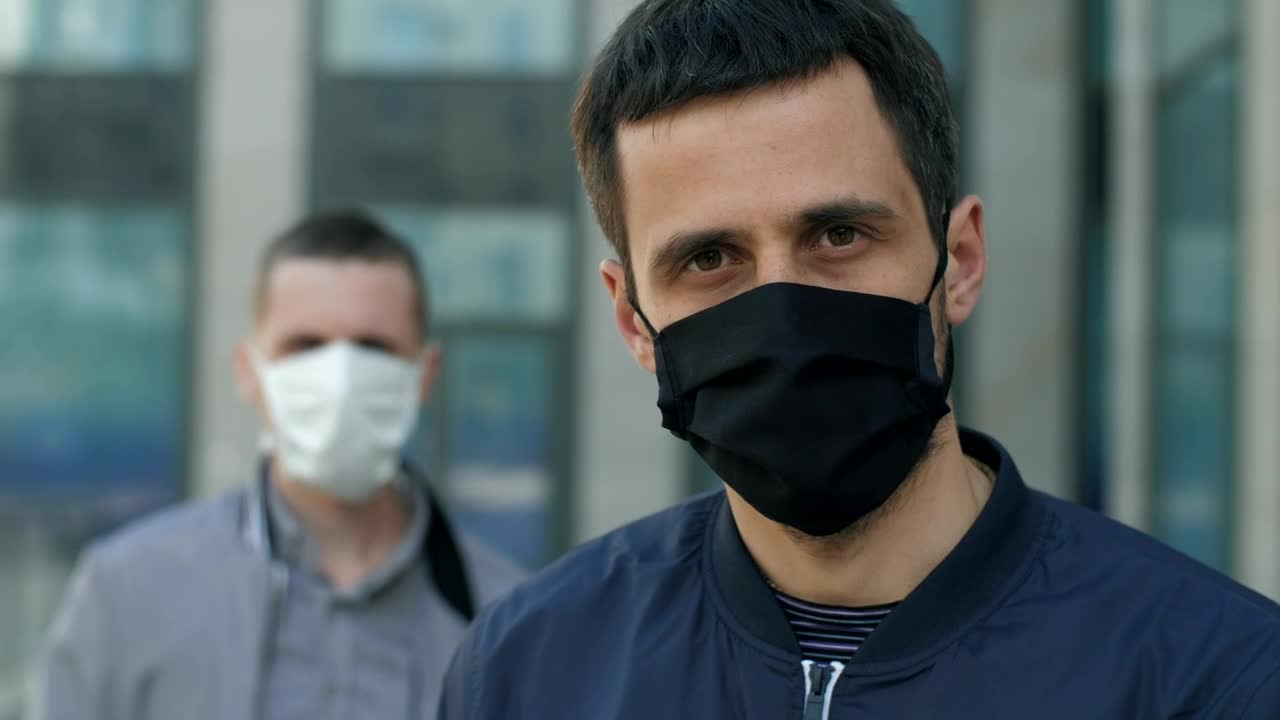 Stock Video Men With Face Masks On The Street Portrai Animated Wallpaper - Free Download